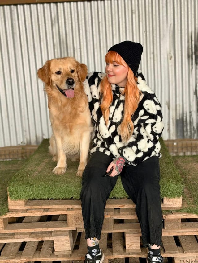 Danielle from Amour Tattoo with her golden retriever Ozzy
